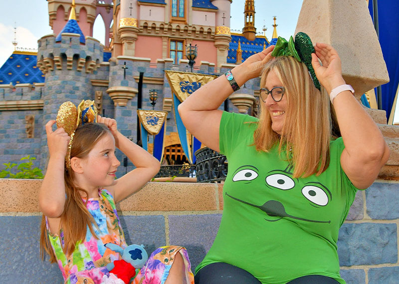 What Makes Disneyland Magical to Me - Girl and Woman hold Disney ears
