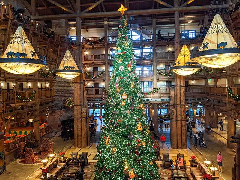 https://cache.undercovertourist.com/blog/2021/06/1121-wilderness-lodge-lobby-christmas-tree.jpg