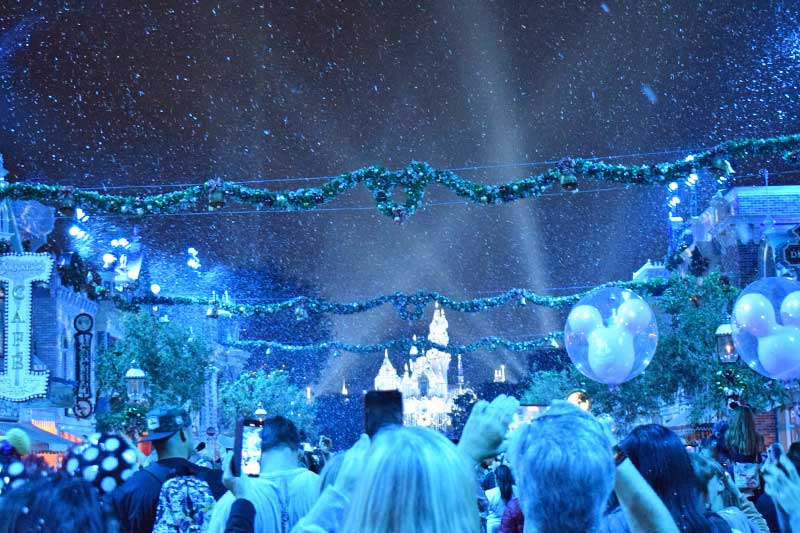 Christmas at Disneyland - Snow falls on Main Street