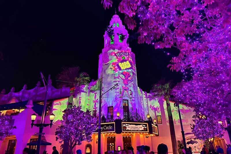 Our Spooky-Good Guide to Disneyland Halloween Time Oogie Boogie Bash projections on Carthay Circle