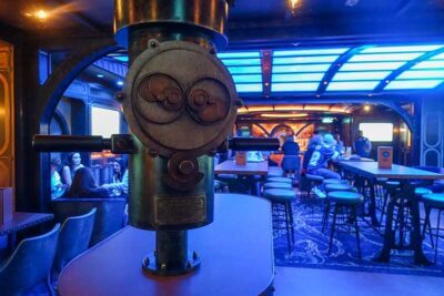 Dive into Nautical Fun: The Periscope Pub Awaits on Disney Treasure