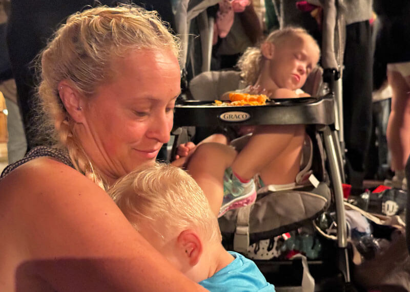 Top 10 Tips for Using a Stroller at Disneyland - Child naps in stroller while waiting for parade