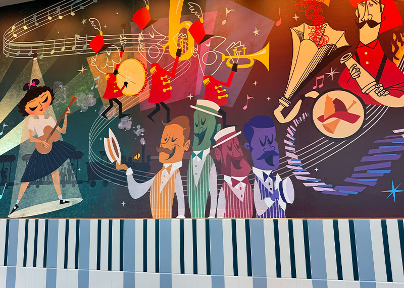 The Frog Family's Guide to the Disneyland Hotel - High Key Club mural with a hidden Mickey