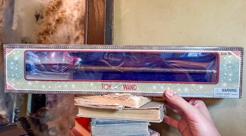 Choosing a Wand at the Wizarding World in Universal Studios Hollywood- toy wand
