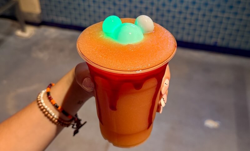 Your Guide to Ghoulishly Good Disneyland Halloween Food - Bloody Orange Slushy from Galactic Grill
