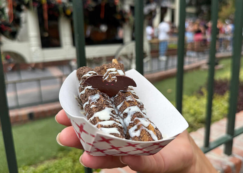 Disneyland Halloween Time Foods - Straw-batty churro