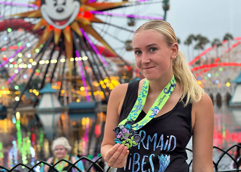 Disneyland Halloween Half Marathon Girl with Medal