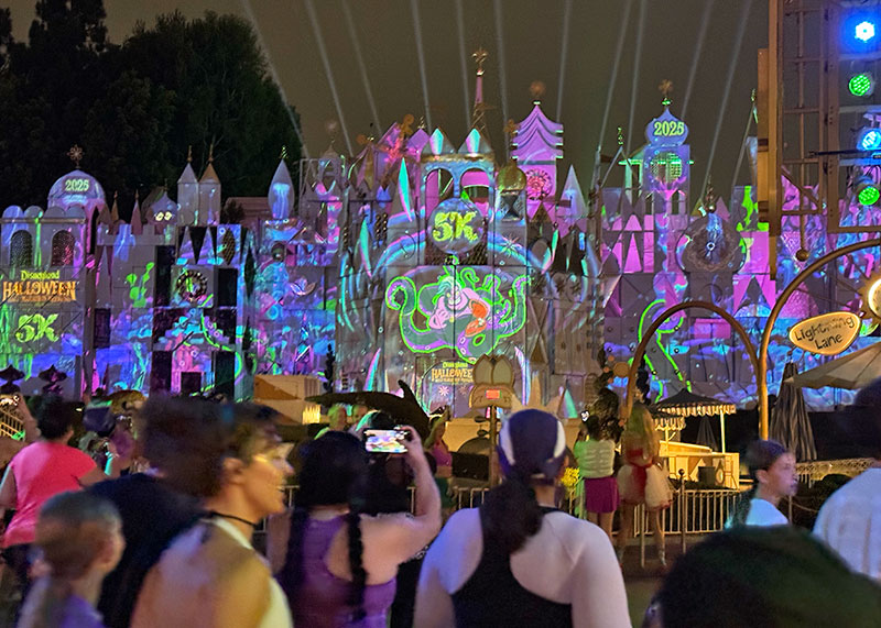 What to Expect at the Disneyland Halloween Half Marathon - Small World projections