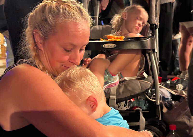 Places to Take a Disneyland Nap - Kids snap while they wait for nighttime parade