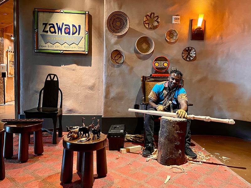 Disney's Animal Kingdom Lodge - Wood carver in the lobby