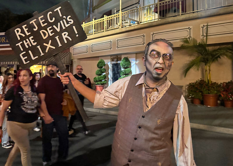 Your Ghoulish Guide to Knott’s Scary Farm - Devil's Elixir sign