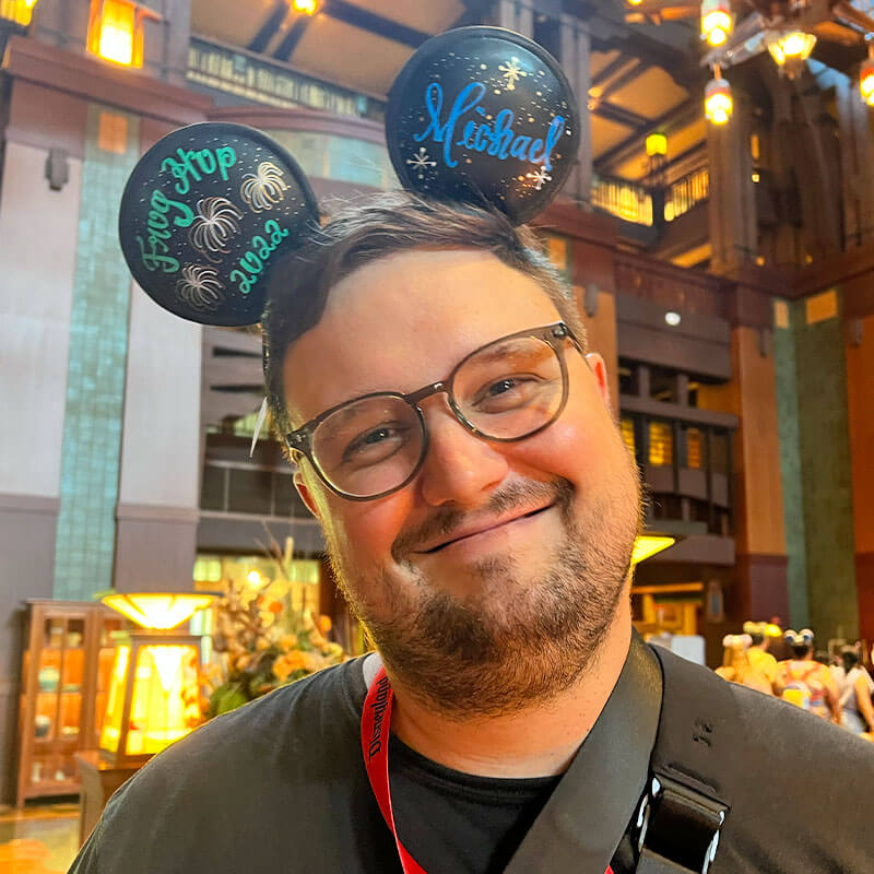 Bring Home the Magic With Unique & Personalized Souvenirs from Disneyland - Man wear personalized ears