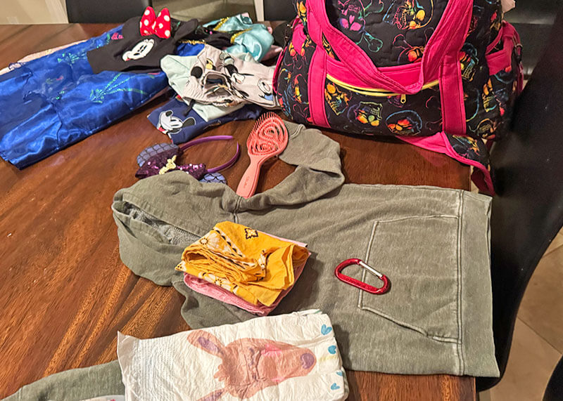 What to Bring to Disneyland with Kids - Packing extra clothes for Disneyland