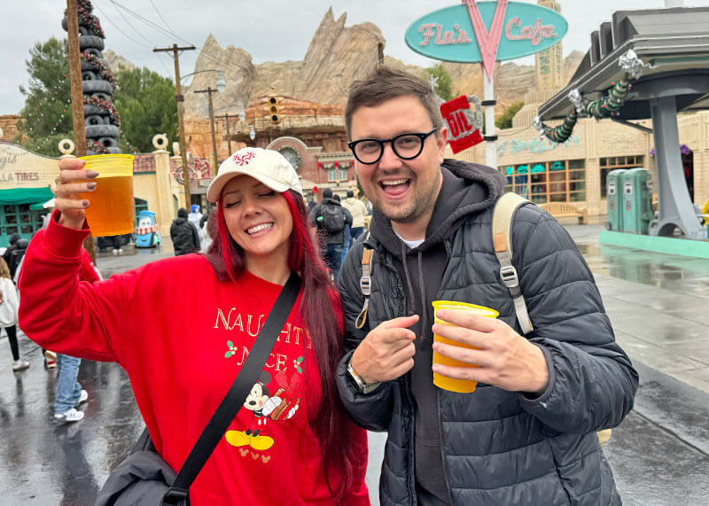 All the Disney California Adventure Holiday Food and Beverages - People with holiday beers from Cozy Cone