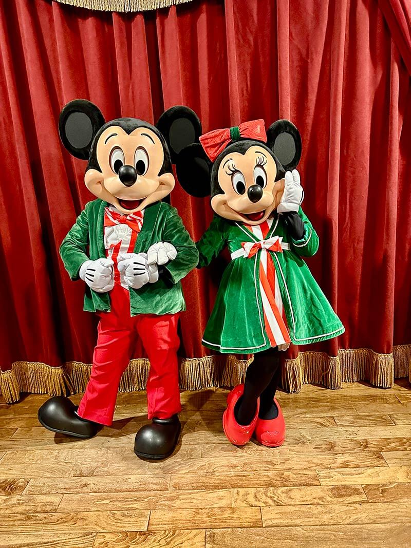 Mickey’s Very Merry Christmas Party - Mickey and Minnie in their holiday outfits