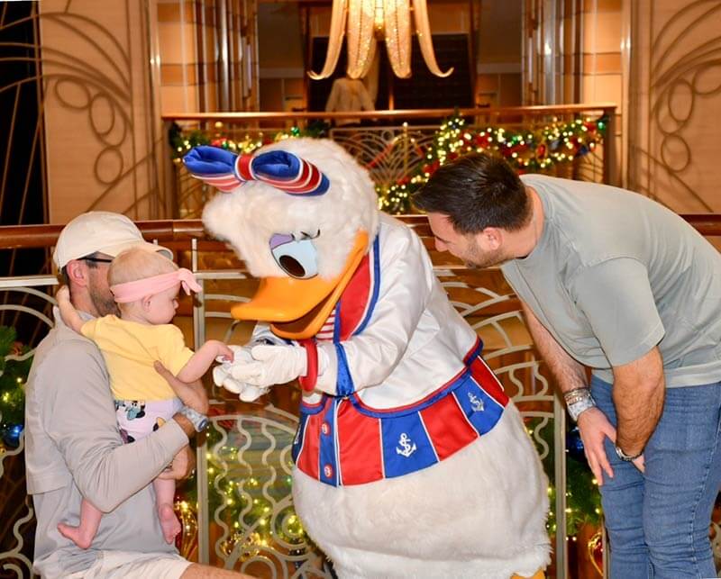 disney cruise with a baby - meet and greet with Daisy Duck