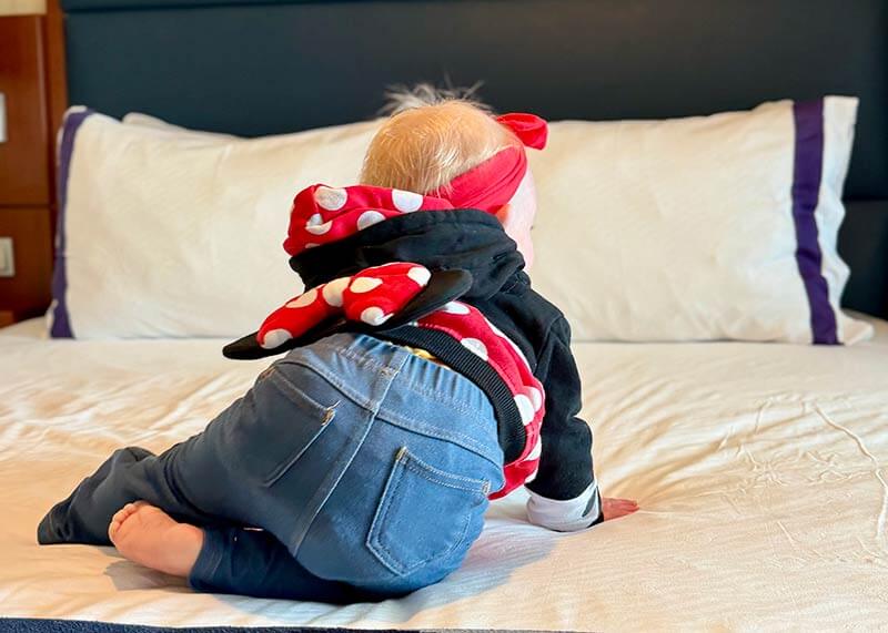disney cruise with a baby - baby on Disney cruise bed