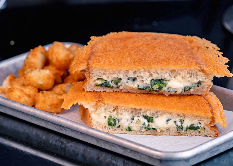 The Full List of Disney California Adventure Food and Wine Festival Menus - artichoke Grilled cheese