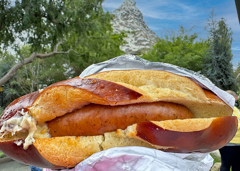 Disneyland Tips to Maximize Your Time - Cheesy Garlic pretzel brat