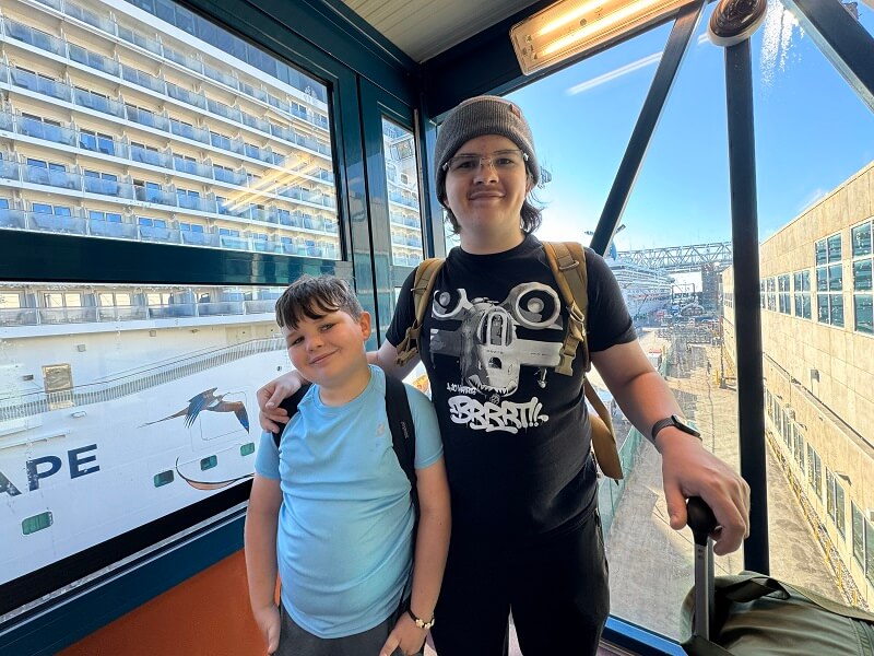 Cruises from New Orleans - Two boys on the gangway ready to board the ship