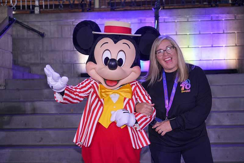 70 Years of Favorites Disneyland After Dark Event - Mickey Mouse posing with guest