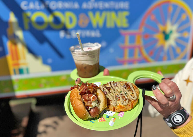 Our Guide to the Disney California Adventure Food & Wine Festival - plate with street dog and pizzeta