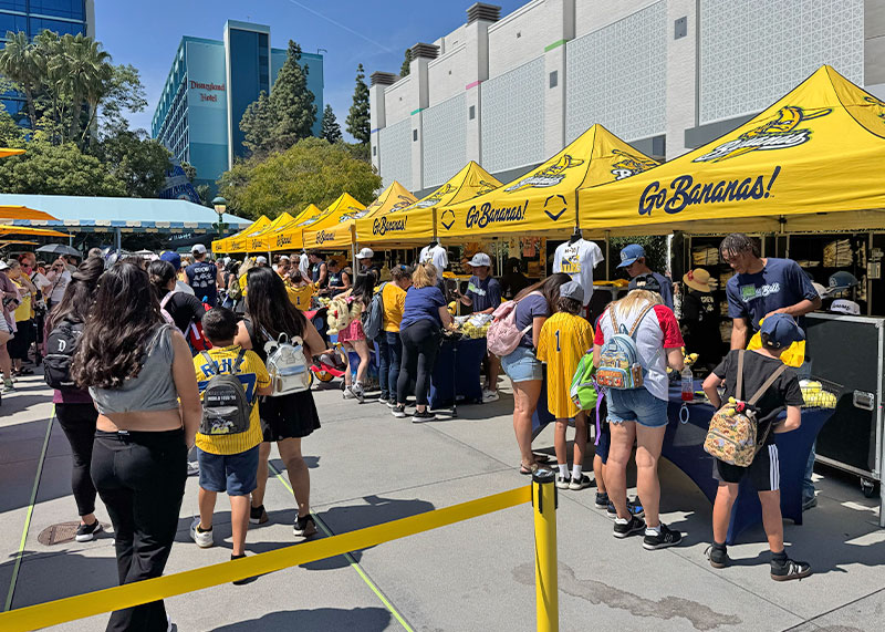 Peel the Magic: Savannah Bananas Day at Disneyland - Merch tents in DTD