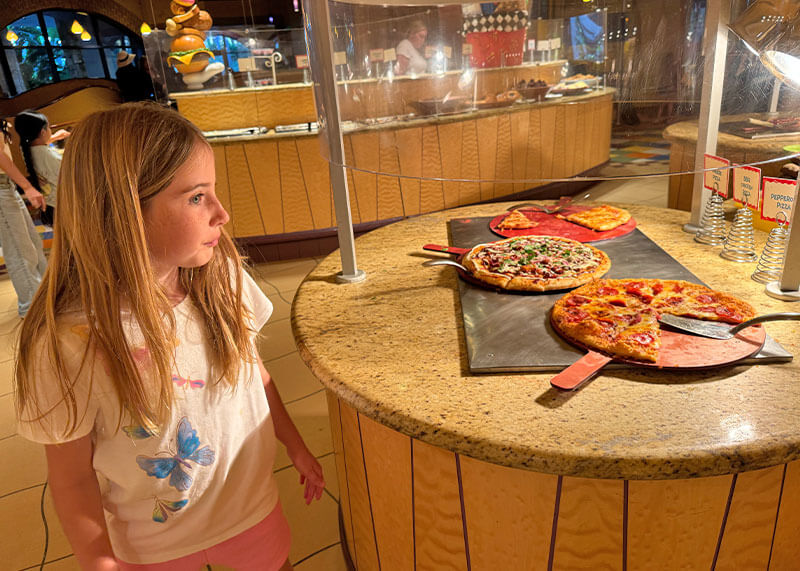 Top Disneyland Kids Menus - Girl looks at low buffet at Goofy;s Kitchen