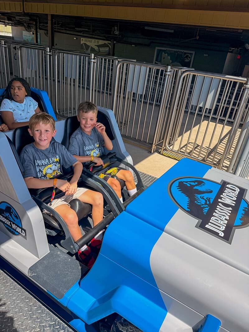 Kids on Jurassic World: Cretaceous Coaster at Universal Kids Resort