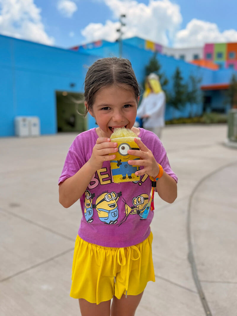 Little Girl with Yellow Minion Shaved Ice at Universal Kids Resort